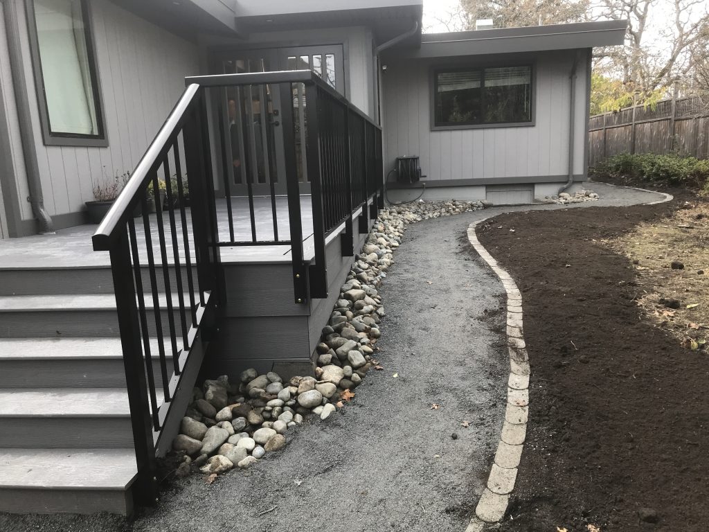 Curved Gravel Pathway with Edging and River Rock 3